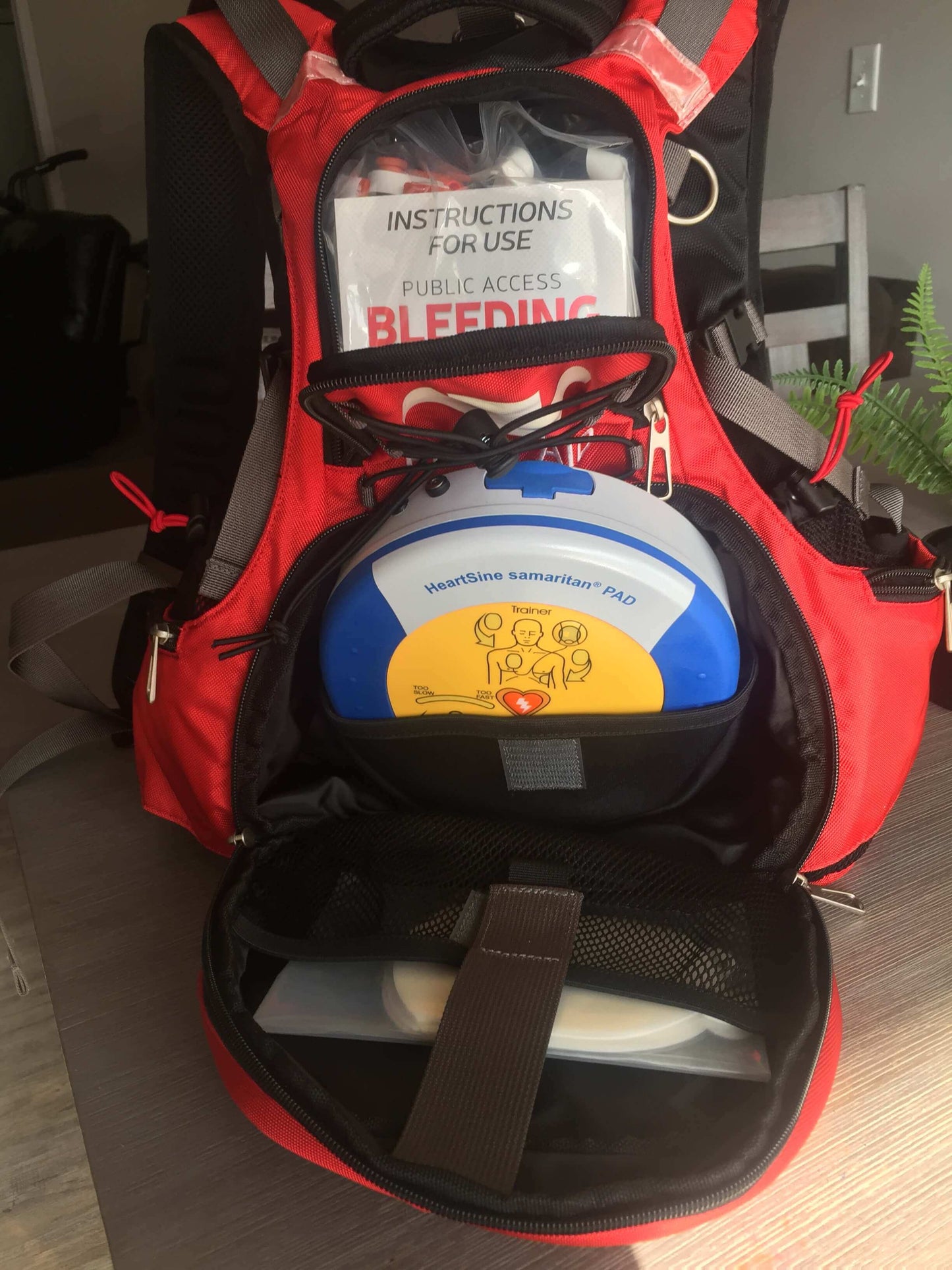 Portable HeartSine AED rescue backpack for athletic programs, event staff, and first responders